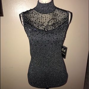 Beautiful sleeveless blouse.